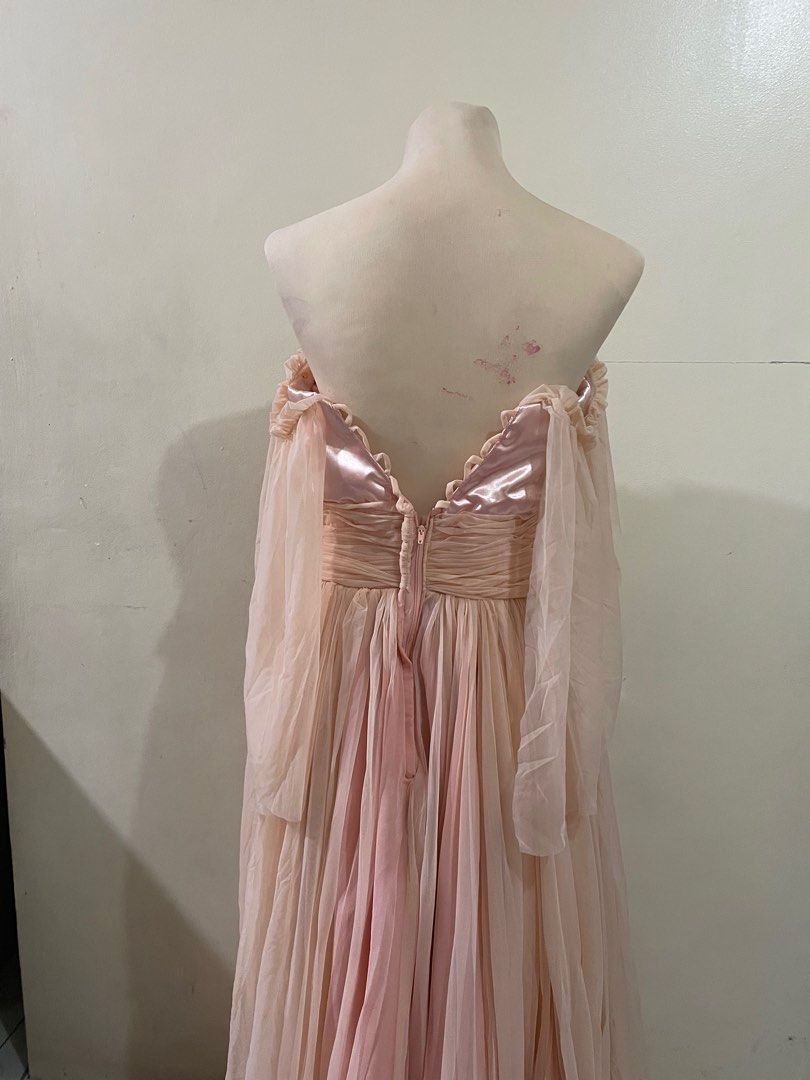 Fairy Gown (Category: Evening dresses & gowns) located in Caloocan City. Submitted by declutter_goods_for_less (Listing ID 1229861237, Image 3). Description: 🧚‍♀️May fit S-L 10/10 Condition 🧚‍♀️Worn once for JS prom 🧚‍♀️Peach Color 🧚‍♀️Message me for more photos and information 🧚‍♀️Shipping Fee will be shouldered by the buyer .
