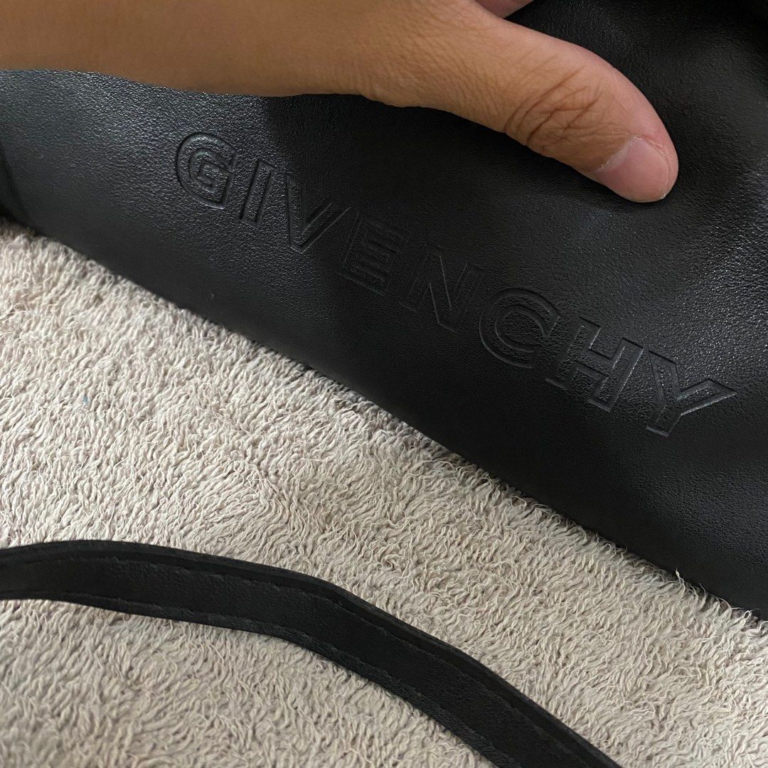 Givenchy 2 Way Shoulder & Clutch Bag Pouch Black Leather (Category: Luxury Bags & Wallets) located in Taguig. Submitted by blackcaat (Listing ID 1229952301, Image 3). Description: Givenchy 2 Way Shoulder & Clutch Bag Pouch Black Leather 21x33cm NEW F/S.