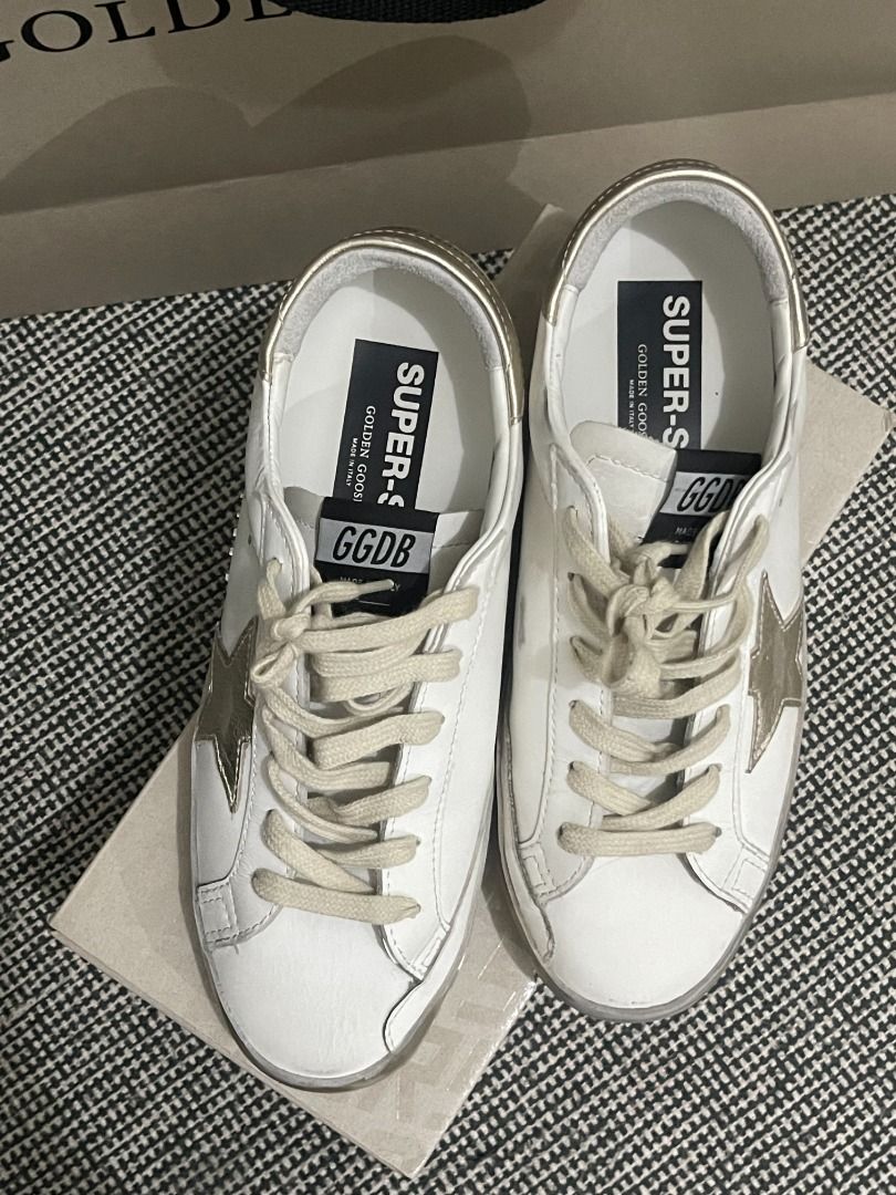 Superstar sneakers with silver sparkle foxing and metal stud lettering sales