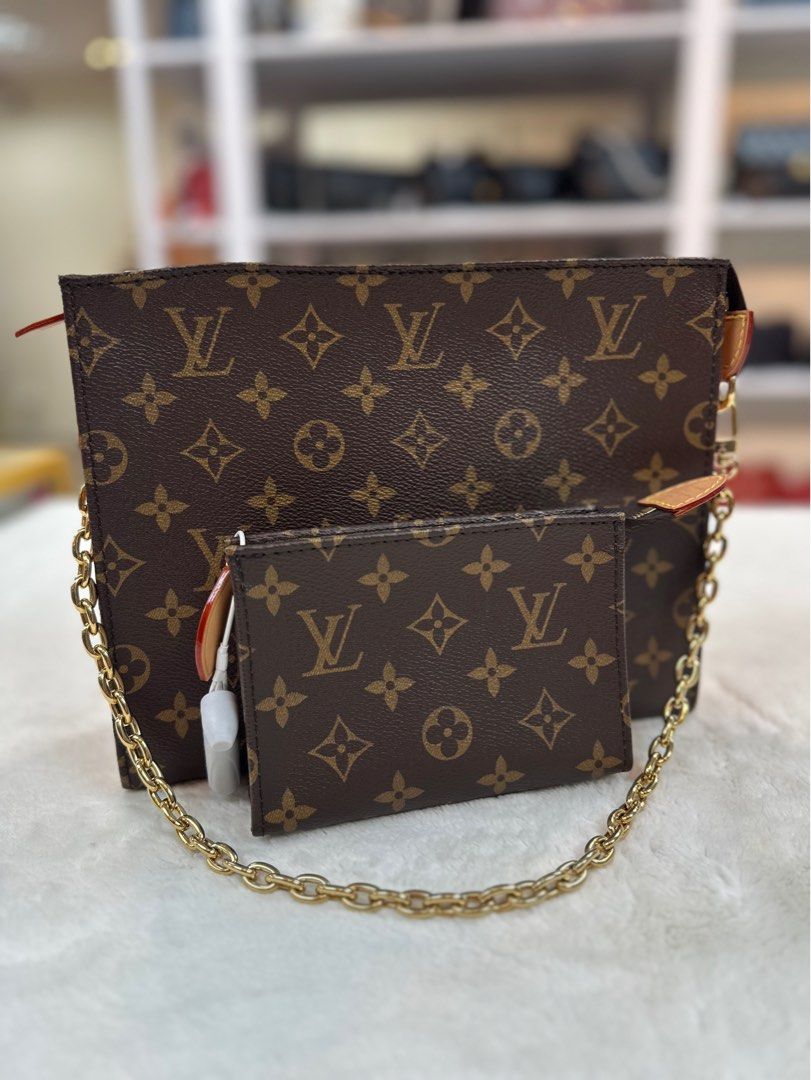 unboxing LV toiletry pouch on chain 