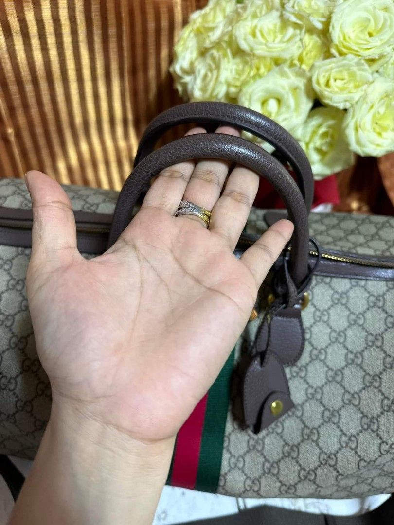 Preloved Gucci Travel bag (Category: Luxury Bags & Wallets) located in Cebu City. Submitted by day.98 (Listing ID 1229887982, Image 3). Description: selected from japan surplus PVC leather 50 cm coded & etikita no flaws with dust bag.
