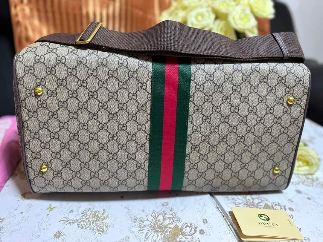 Preloved Gucci Travel bag (Category: Luxury Bags & Wallets) located in Cebu City. Submitted by day.98 (Listing ID 1229887982, Image 2). Description: selected from japan surplus PVC leather 50 cm coded & etikita no flaws with dust bag.