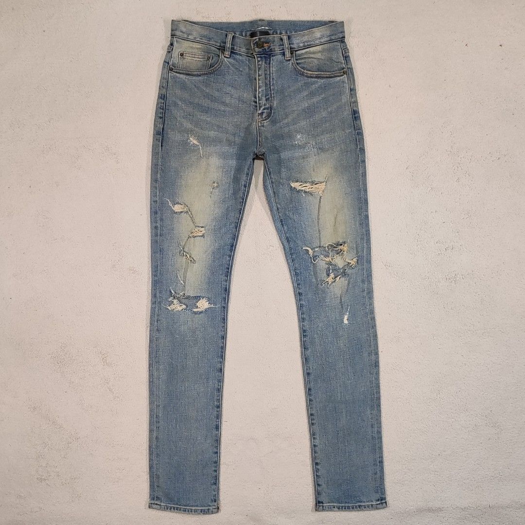 Saint laurent cheap ripped knee jeans