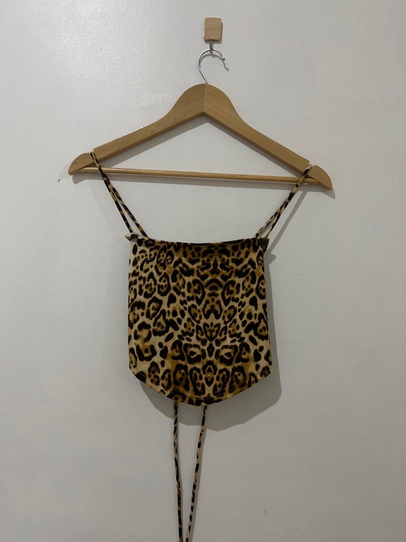 Y2K Animal Print Backless Tie Croptop (Category: Others Tops) located in Manila. Submitted by everythingofgela (Listing ID 1229948236, Image 3). Description: Never used just tried on - Very baddie energy - Perfect for bar nights !!.