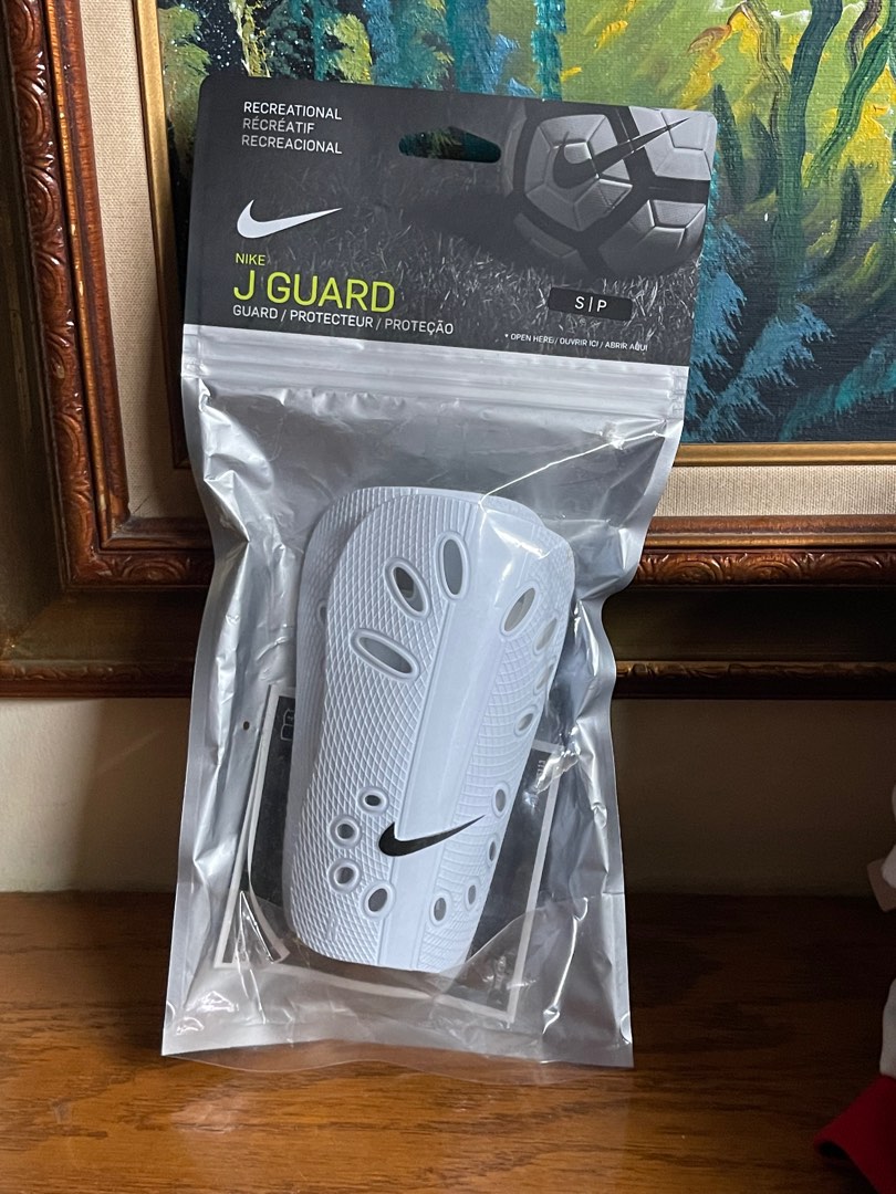 white nike shin guards