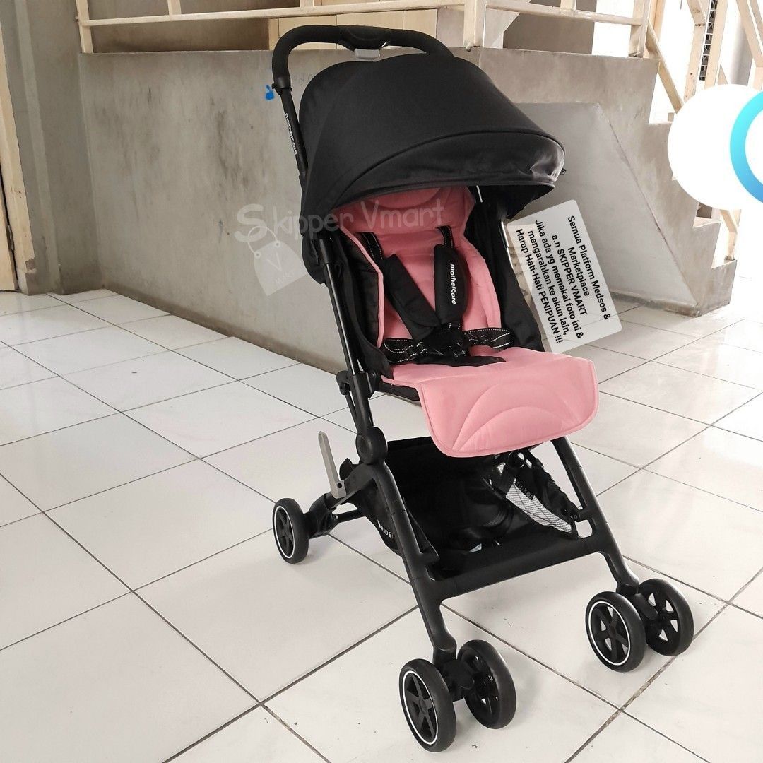 Mothercare ride shop stroller pink