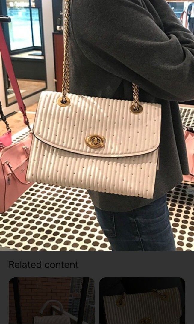 Coach parker with cheap quilting and rivets