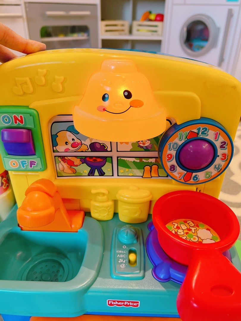 Fisher price laugh and sale learn shape sorter