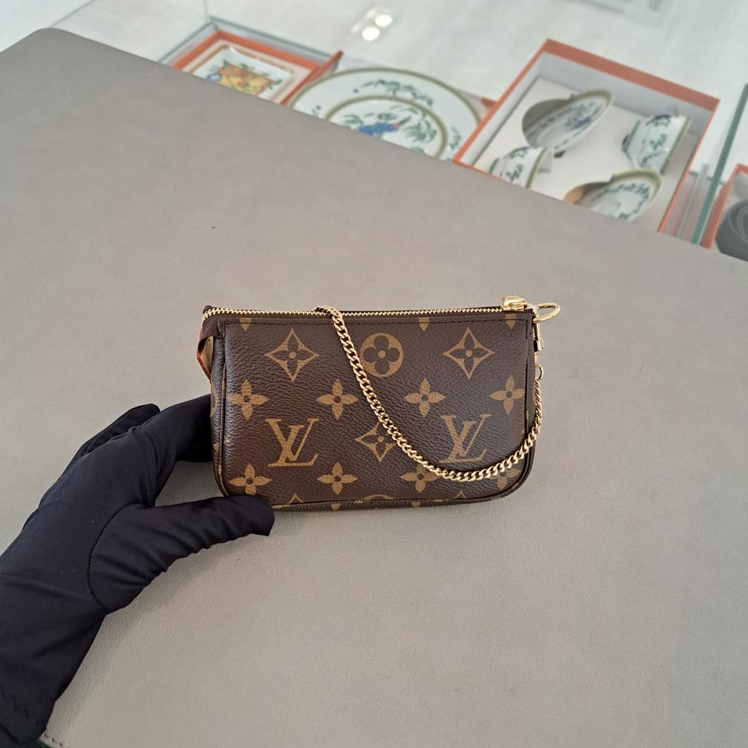 Louis Vuitton (LV) short leather strap for the Pochette Accessories clutch,  Luxury, Bags & Wallets on Carousell