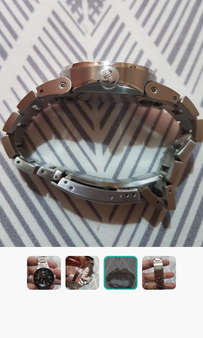Oris F1 (Category: Luxury Watches) located in Quezon City. Submitted by dolf2017 (Listing ID 1234671351, Image 3). Description: Oris F1 automatic sports watch with attractive amber stripes. Double lock design with day and date features. Hardly used 9/10 for my collection and important gatherings only. See to appreciate..