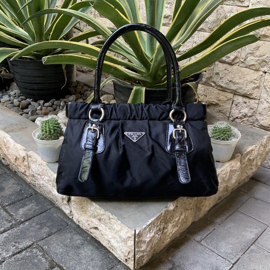 Prada vela handle bag store