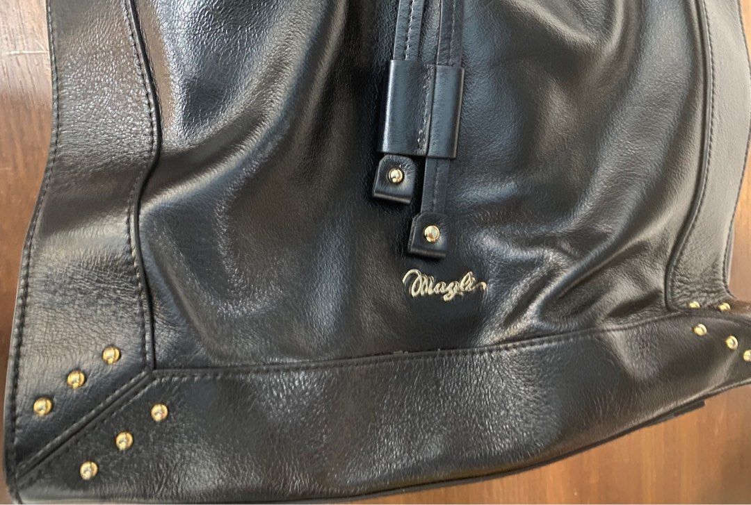 Preloved Bruno Magli Shoulder Bag (Category: Luxury Bags & Wallets) located in Quezon City. Submitted by pixyme (Listing ID 1234655579, Image 2). Description: Preloved Bruno Magli bag in great condition. Leather bag with no tarnishing of hardware..