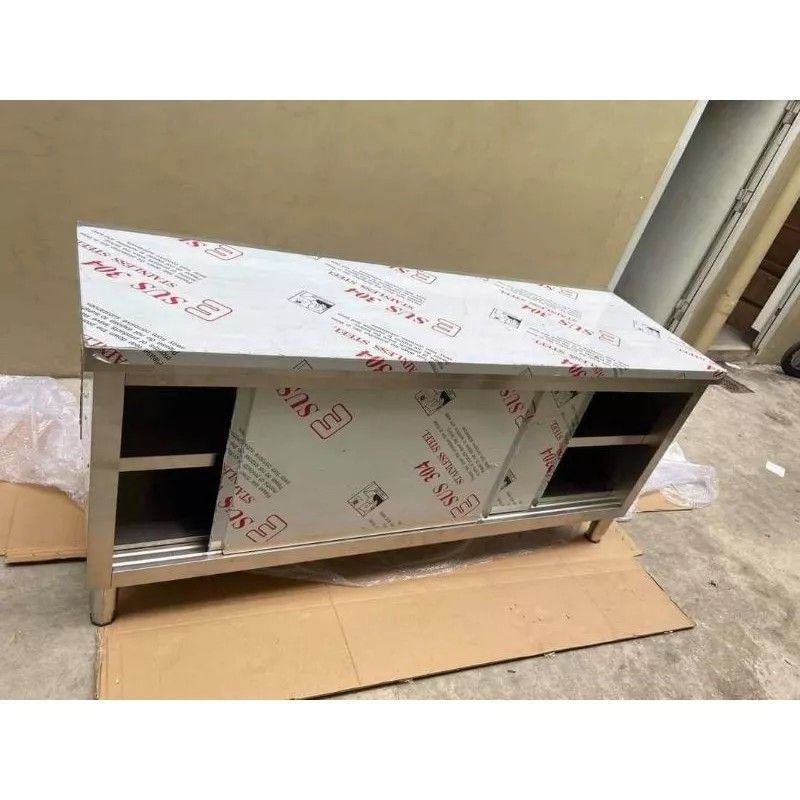 150x60x80cm preparation table with cabinet (Category: Coffee & Tea Tableware) located in Manila. Submitted by vangabriel26 (Listing ID 1234972529, Image 2). Description: preparation table with cabinet stainless Steel sliding door 304 stainless Steel kitchen preparation table with cabinet.