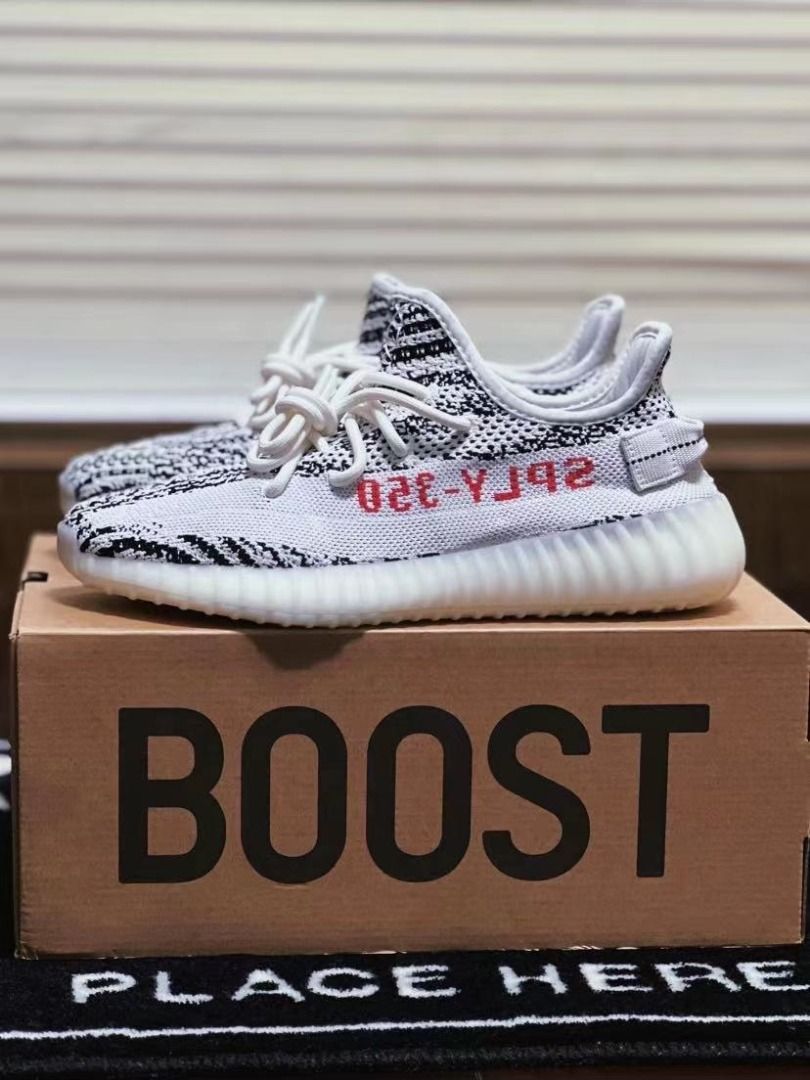 Adidas yeezy triple white zebra best sale