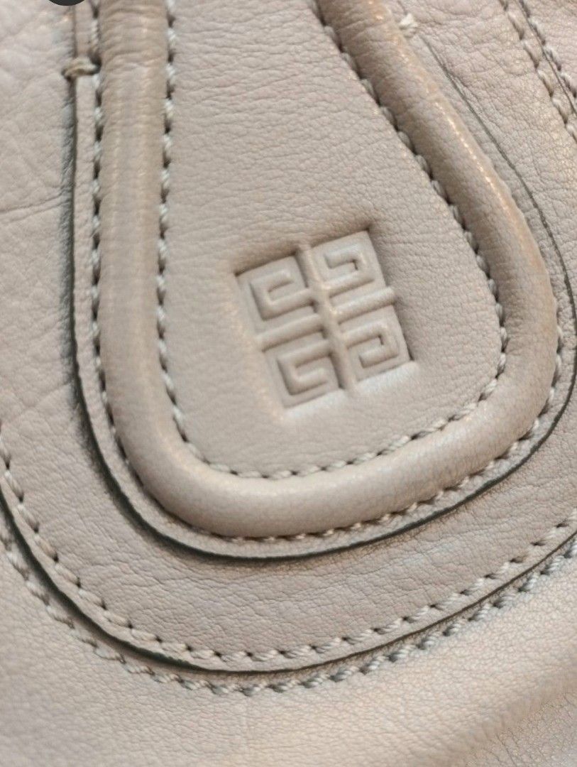 Authentic Givenchy Nightingale medium (Category: Luxury Bags & Wallets) located in Quezon City. Submitted by cheapdealsqc (Listing ID 1234814940, Image 2). Description: authentic usual signs of usage (barely noticeable) SIZE MEDIUM: 12” (H) x 14” (W) x 6.5” (D).