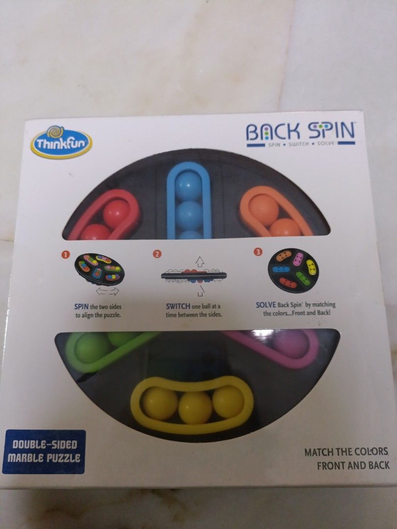 Back Spin by Thinkfun (Category: Board Games & Puzzles) located in Singapore. Submitted by predprey24 (Listing ID 1234938751, Image 2). Description: Back Spin by Thinkfun - Double-sided Marble Puzzle - Spin, Switch, Solve - Single Player - Ages 8+.