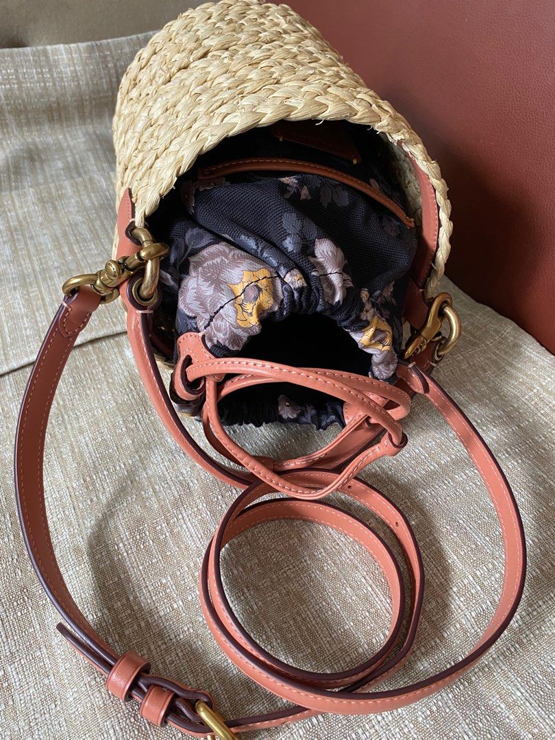 Coach Bucket Bag (Category: Luxury Bags & Wallets) located in Bulacan. Submitted by thedeclutteringmom (Listing ID 1234821992, Image 3). Description: Guaranteed original Coach bucket drawstring bag Perfect for get away, summer bag 19cm height , 17cm diameter Can use the bag as-is or attach the floral fabric drawstring pouch Use as handbag or body bag.