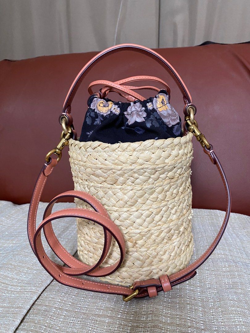 Coach Bucket Bag (Category: Luxury Bags & Wallets) located in Bulacan. Submitted by thedeclutteringmom (Listing ID 1234821992, Image 1). Description: Guaranteed original Coach bucket drawstring bag Perfect for get away, summer bag 19cm height , 17cm diameter Can use the bag as-is or attach the floral fabric drawstring pouch Use as handbag or body bag.