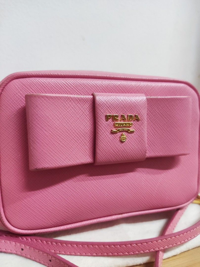 Authentic Prada Saffiano Micro crossbody sling bag (Category: Luxury Bags & Wallets) located in Quezon. Submitted by jmako (Listing ID 1234813570, Image 2). Description: good condition clean inside.