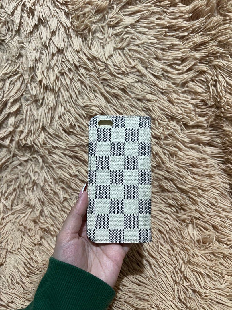 💯 Authentic Louis Vuitton iPhone 5/5s Phone (Category: Cases & Sleeves) located in Paranaque City. Submitted by authentic_mj (Listing ID 1230147247, Image 3). Description: 💯 Authentic Louis Vuitton iPhone 5/5s Phone Flip Case Preloved Authentic from Japan Issue: Heat stamp initials.