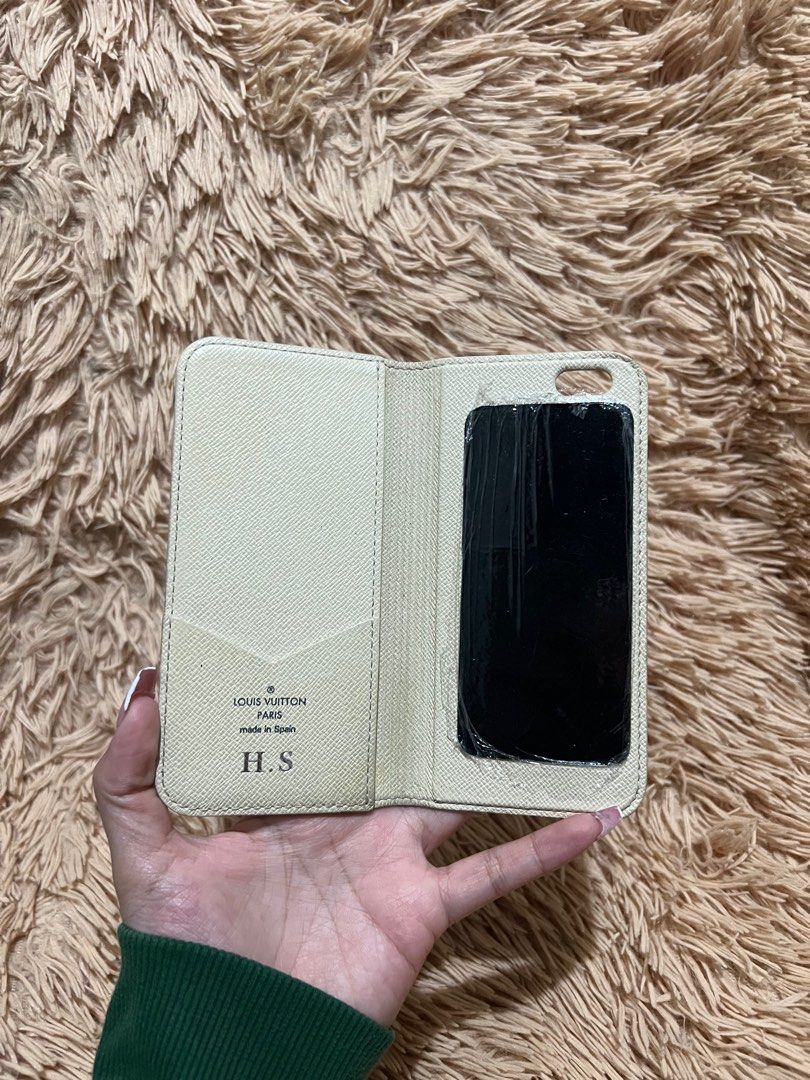 💯 Authentic Louis Vuitton iPhone 5/5s Phone (Category: Cases & Sleeves) located in Paranaque City. Submitted by authentic_mj (Listing ID 1230147247, Image 2). Description: 💯 Authentic Louis Vuitton iPhone 5/5s Phone Flip Case Preloved Authentic from Japan Issue: Heat stamp initials.