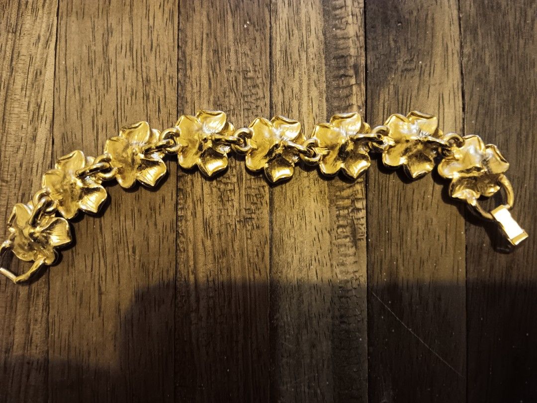 Gold ROSE flower bracelet (Category: Bracelets) located in Makati City. Submitted by affordable_premium (Listing ID 1230179092, Image 2). Description: This is gold-colored only but well made from Canada. Reason for selling: Style change I am a full time employee so I appreciate your patience for any response delays. I will reply as soon as I can. Thank you!.