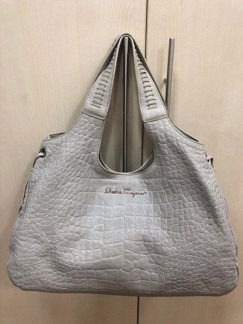 Salvatore Ferregamo (Category: Luxury Bags & Wallets) located in Quezon City. Submitted by favourite_things (Listing ID 1230090799, Image 1). Description: Lightly used, leather.