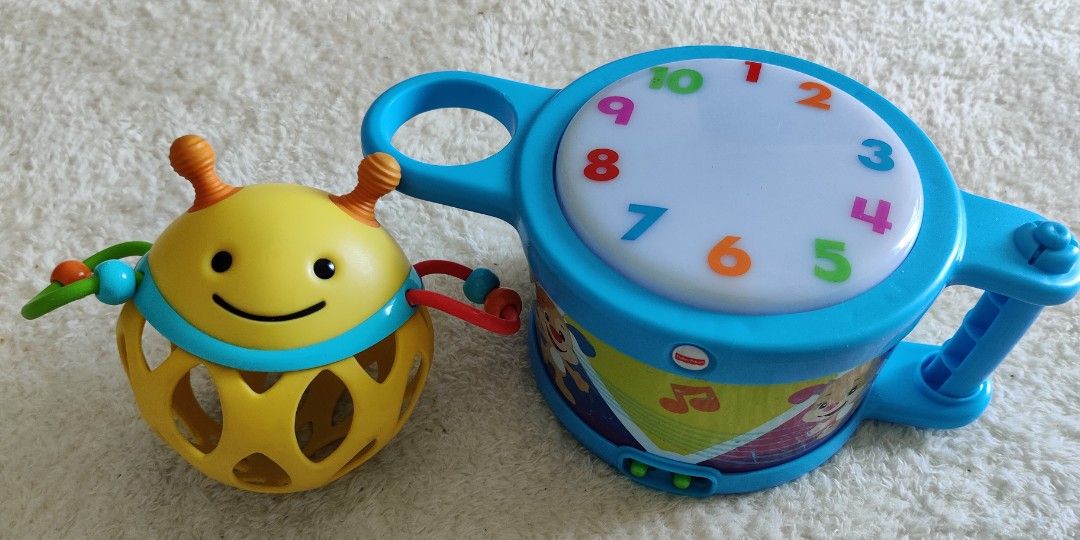 Fisher price tap and teach drum hotsell