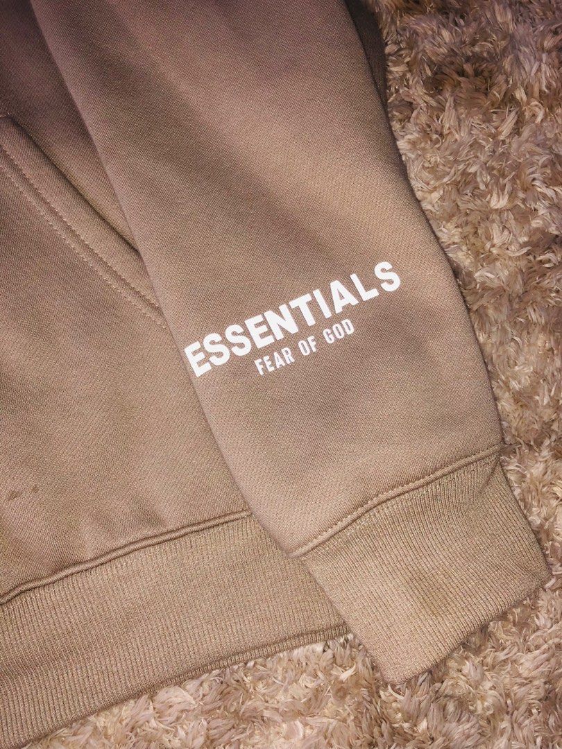 FEAR OF GOD ESSENTIALS HOODIE (Category: Coats, Jackets and Outerwear) located in Oton. Submitted by dominicray07 (Listing ID 1230266890, Image 3). Description: MEDIUM BUT TYPICAL FOG SIZING FITS LARGE.