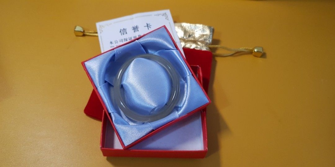 Jade bangle (Category: Bracelets) located in Singapore. Submitted by sweetsharestop (Listing ID 1228136174, Image 1). Description: Oval shape jade bangle from China. Unique grey purplish color. Comes with certificate proven authentic product..