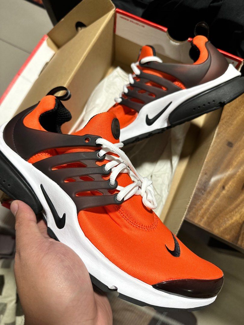 Black and orange nike presto sale