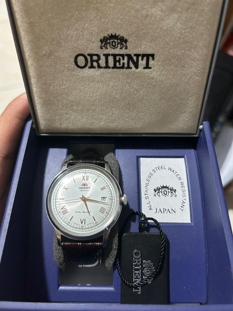 Harga top orient bambino