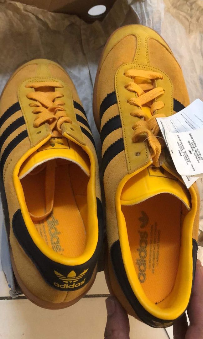 Yellow and sale black adidas trainers