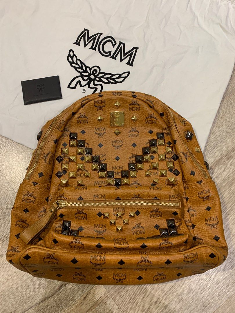 Authentic MCM Backpack ( Look at the receipt and if its fake i will hold  full legal resonsibilty ), Luxury, Bags & Wallets on Carousell