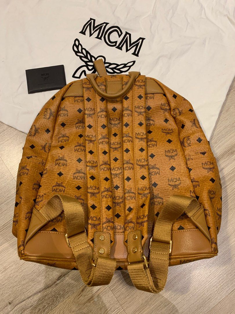 Authentic mcm hotsell bag vs fake