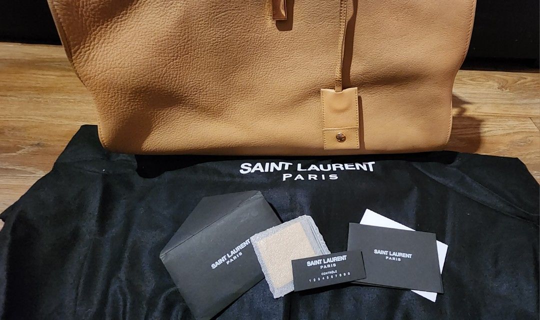Authentic YSL Cabas (Category: Luxury Bags & Wallets) located in Las Pinas. Submitted by motherdaughterbm (Listing ID 1230389808, Image 2). Description: FS or Swap to smaller bag YSL Cabas Nude color medium size w/ dust bag, care card and color swatch.