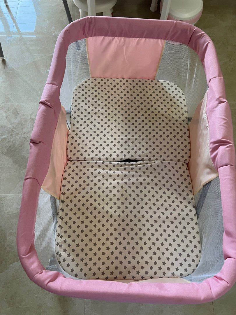 Foldable cot (Category: Cots & Cribs) located in Singapore. Submitted by cloveclothes (Listing ID 1230356867, Image 3). Description: Foldable cot lightly used. Measurements - 90cm L x 49cm W (inner mattress) Dimension of outer cot - 94cm length x 80cm height .