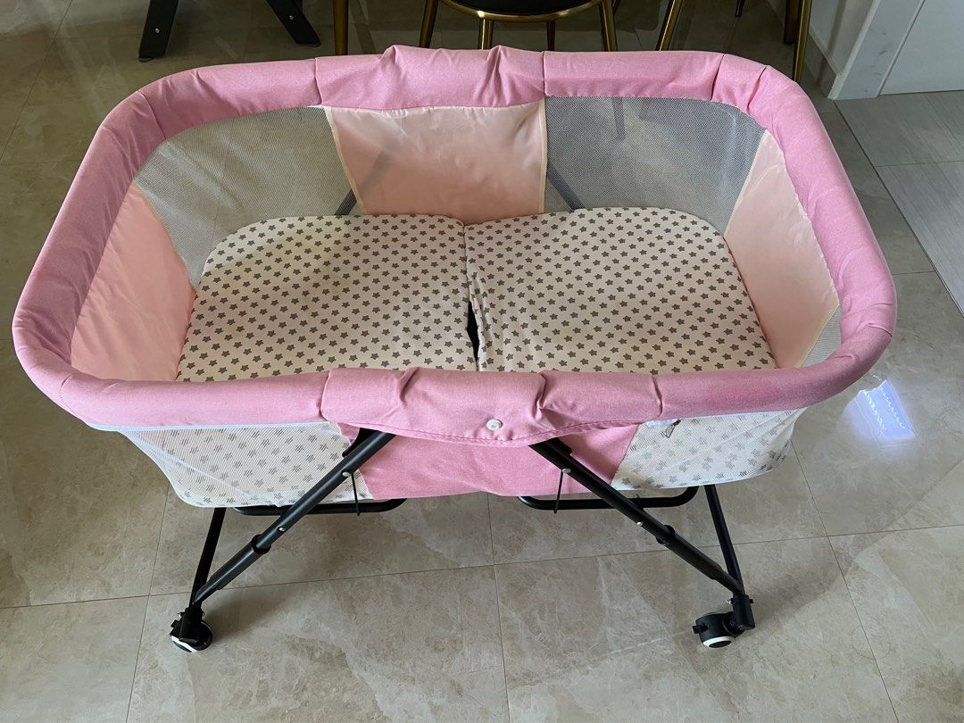 Foldable cot (Category: Cots & Cribs) located in Singapore. Submitted by cloveclothes (Listing ID 1230356867, Image 1). Description: Foldable cot lightly used. Measurements - 90cm L x 49cm W (inner mattress) Dimension of outer cot - 94cm length x 80cm height .