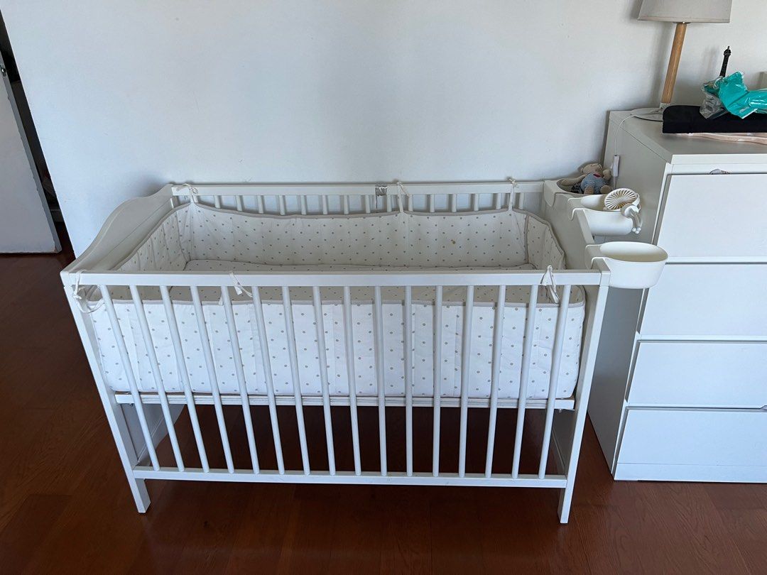 IKEA Crib and mattress and sheets and bumper pad and accessories