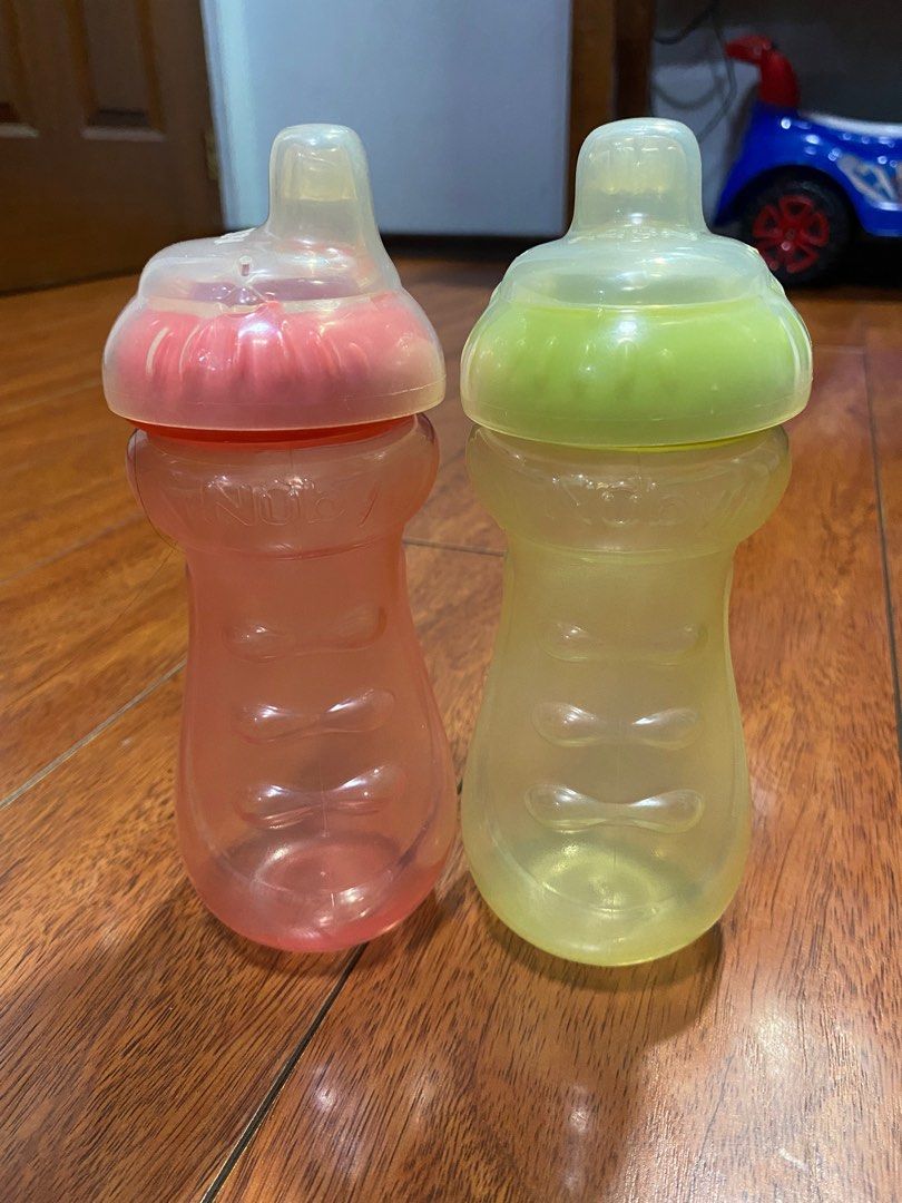 Nuby Sippy Cups/Bottles (Category: Breastfeeding & Bottle Feeding) located in Quezon City. Submitted by toothfairy0323 (Listing ID 1230479574, Image 1). Description: Sold as set. Still in useable condition but for hygiene purposes pls use new teats.