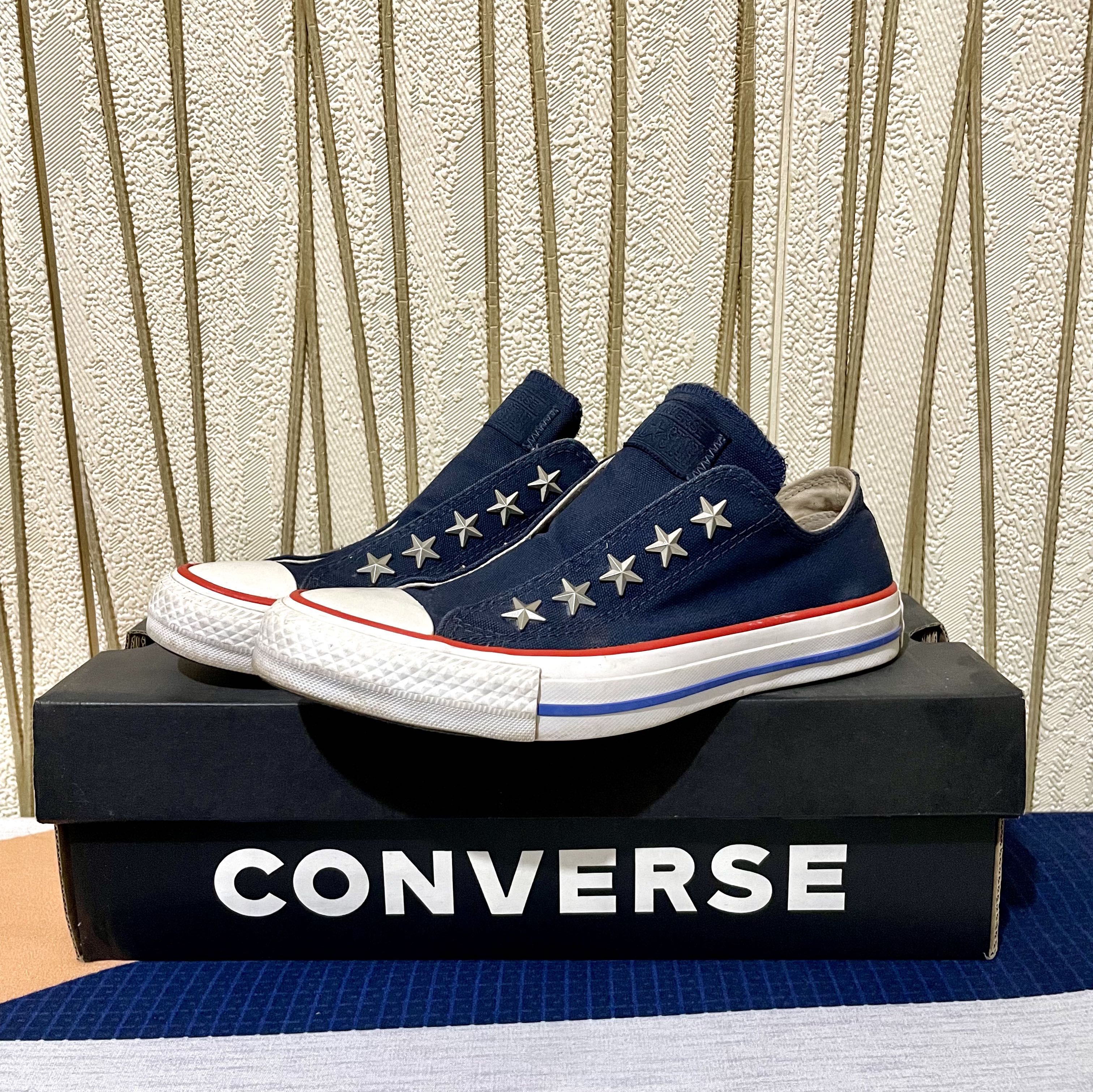 Converse slip on navy deals