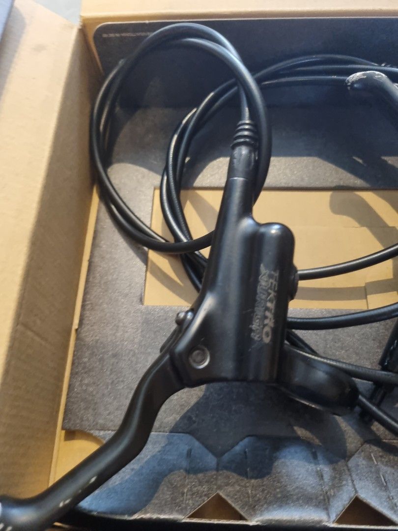 tektro xuriga brakes adjustment