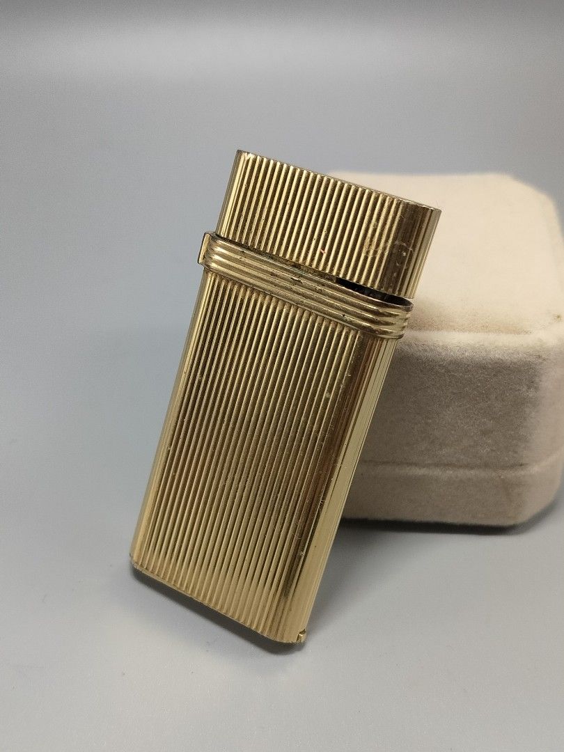 CHRISTIAN DIOR GOLD LIGHTER on Carousell