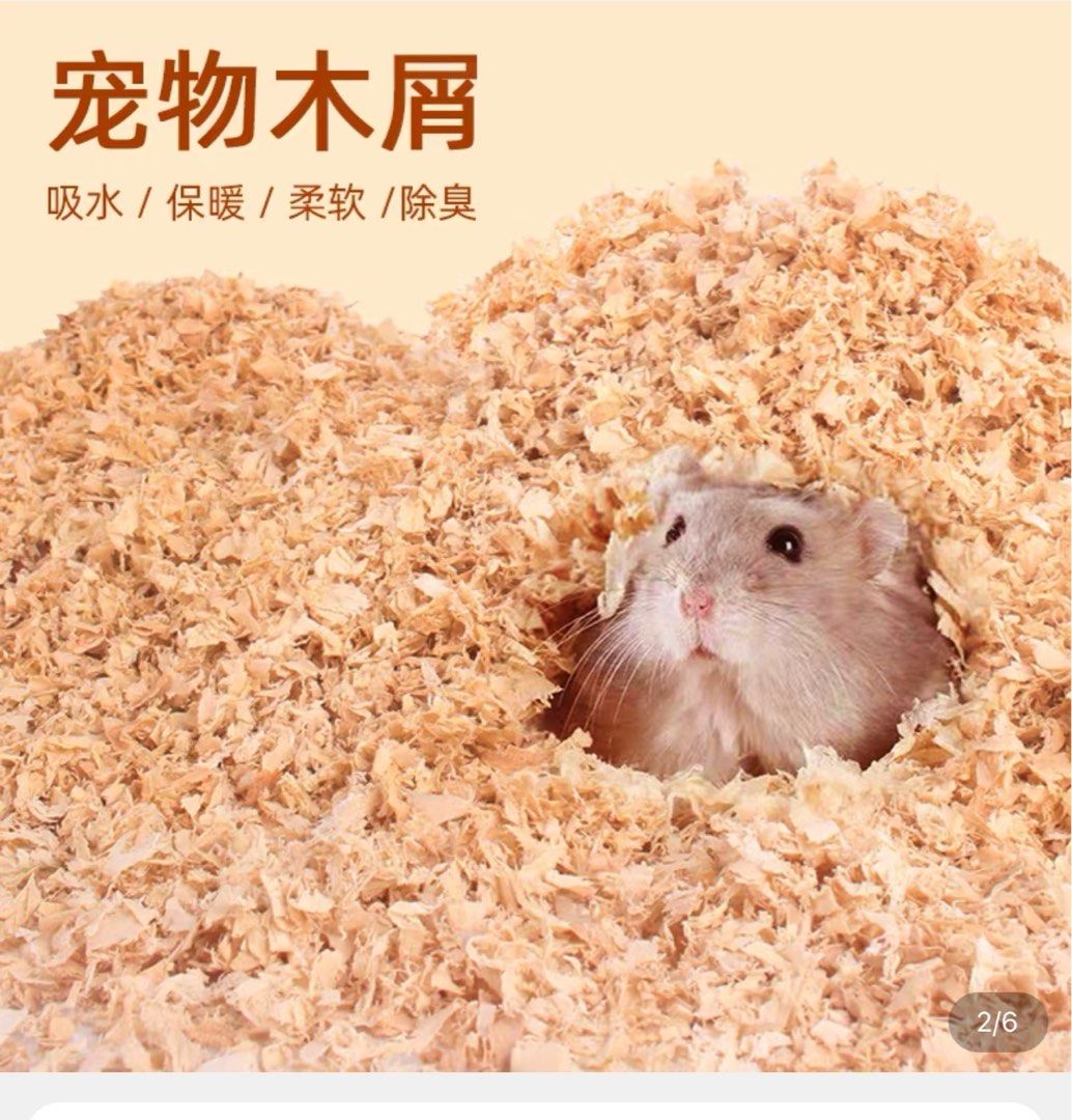 Hamster cage wood shavings top