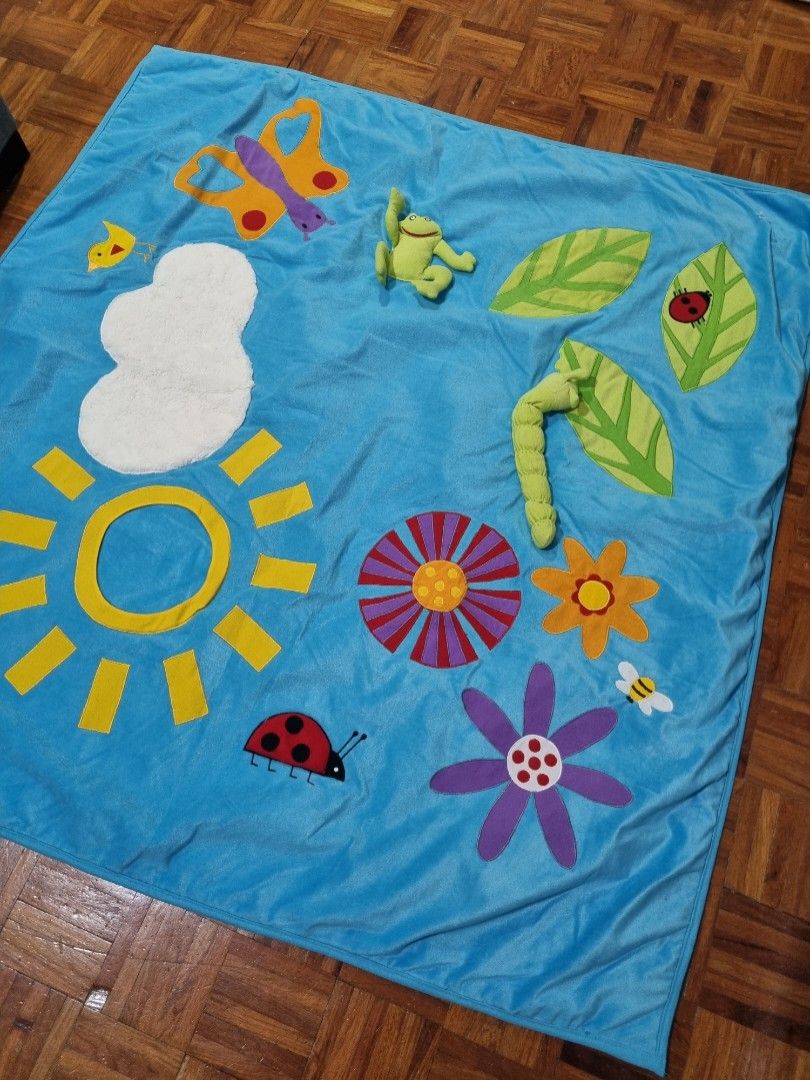 Ikea Leka Play Mat (Category: Infant Playtime) located in Paranaque City. Submitted by mrsmommyholic (Listing ID 1230648042, Image 2). Description: Ikea Leka Play Mat 45 x 45 inches back part has some stains from storage can be washed RFS: decluttering.