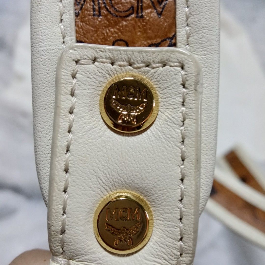 MCM Visetos XMini Stark Backpack in Cognac and White on Carousell