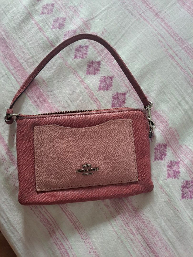 Pink coach wristlet wallet sales