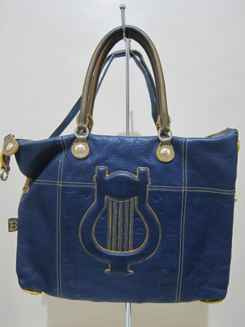 PreLoved BRERA Rare print two way bag (Category: Shoulder Bags) located in Quezon City. Submitted by help_ahoarder (Listing ID 1230567030, Image 2). Description: Soft leather and adjustable, a pretty mix of blue and yellow. This bag has a lot of imperfections on the leather that's why I'm selling it low but the overall effect of the bag is still stunning. 😊 🌺 LAST PRICE POSTED. Please don't offer if you're not sure if you're going to take it. I