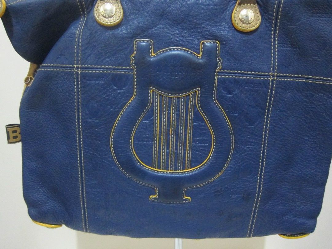 PreLoved BRERA Rare print two way bag (Category: Shoulder Bags) located in Quezon City. Submitted by help_ahoarder (Listing ID 1230567030, Image 3). Description: Soft leather and adjustable, a pretty mix of blue and yellow. This bag has a lot of imperfections on the leather that's why I'm selling it low but the overall effect of the bag is still stunning. 😊 🌺 LAST PRICE POSTED. Please don't offer if you're not sure if you're going to take it. I