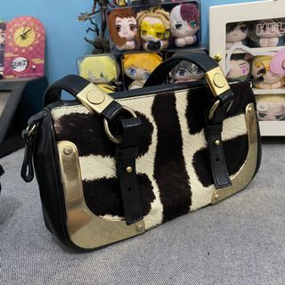 Pony-style calfskin clutch bag Saint Laurent Beige in Pony-style